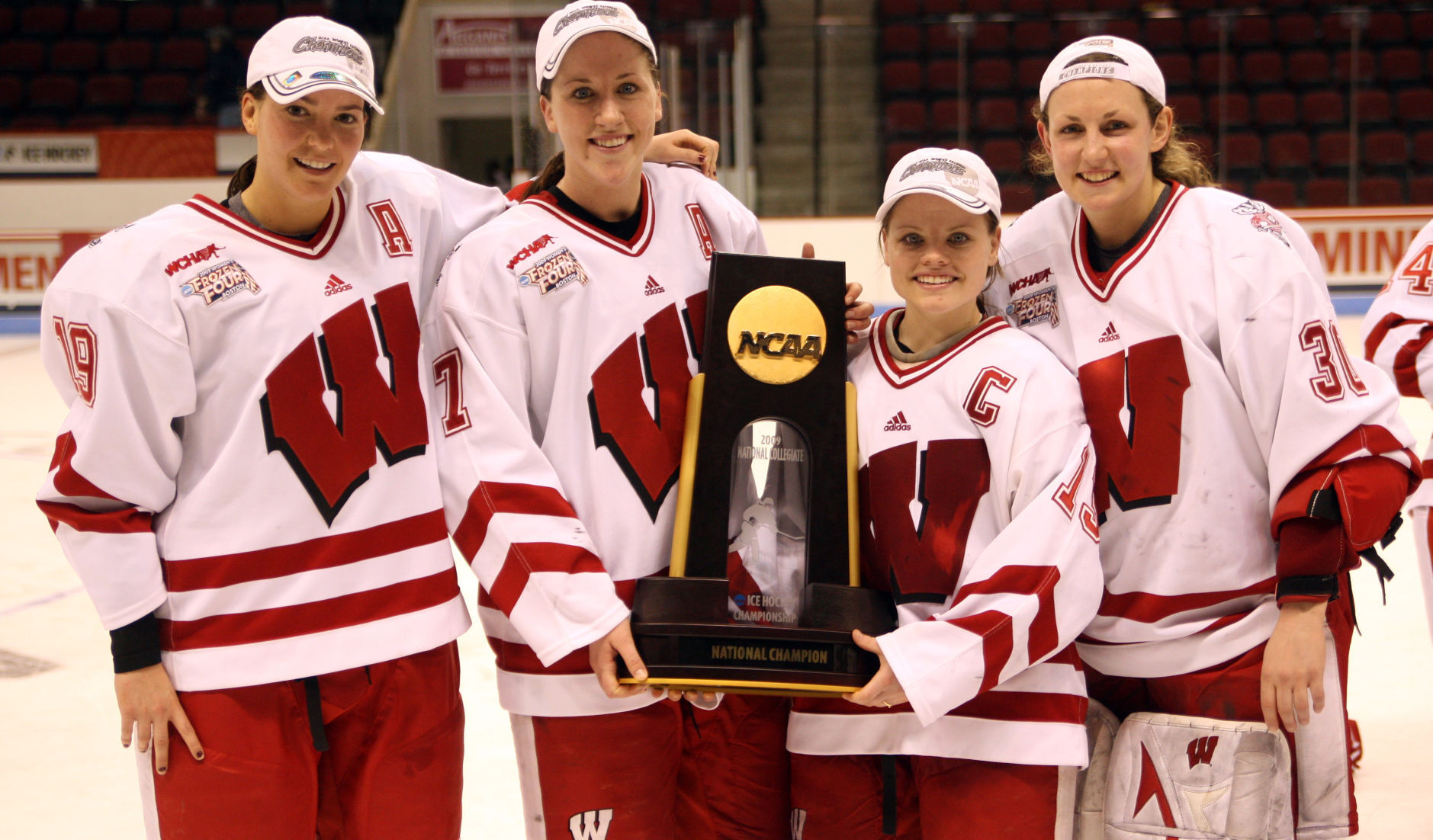 Captains with the 2009 trophy